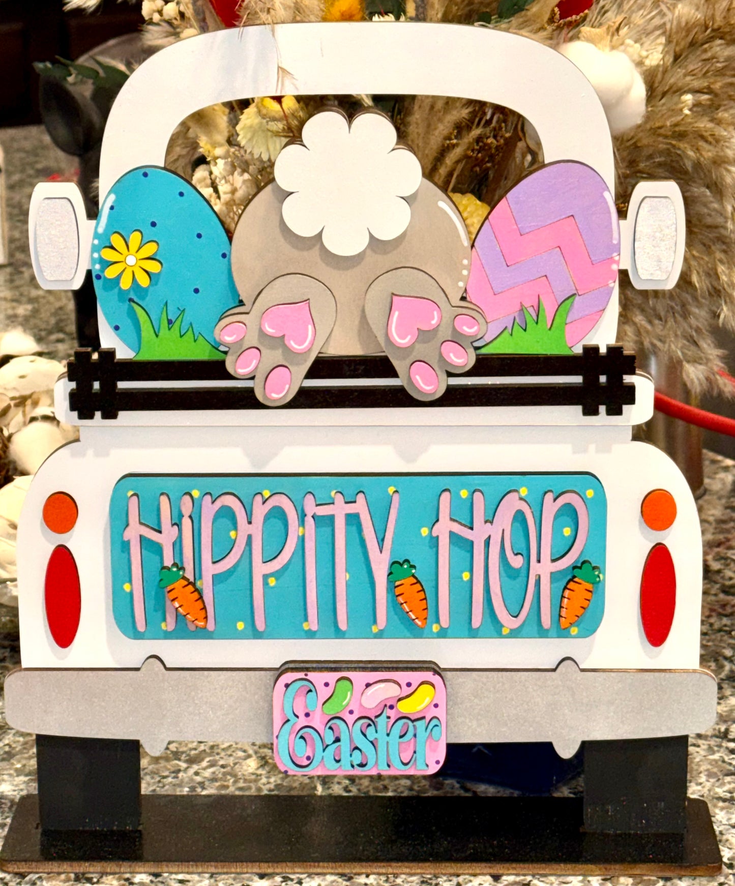 Decorative Easter bunny butt with fun spring colors and 'Hippity Hop Easter' interchangeable insert for our Farmhouse Truck shelf sitter or hanging sign. 