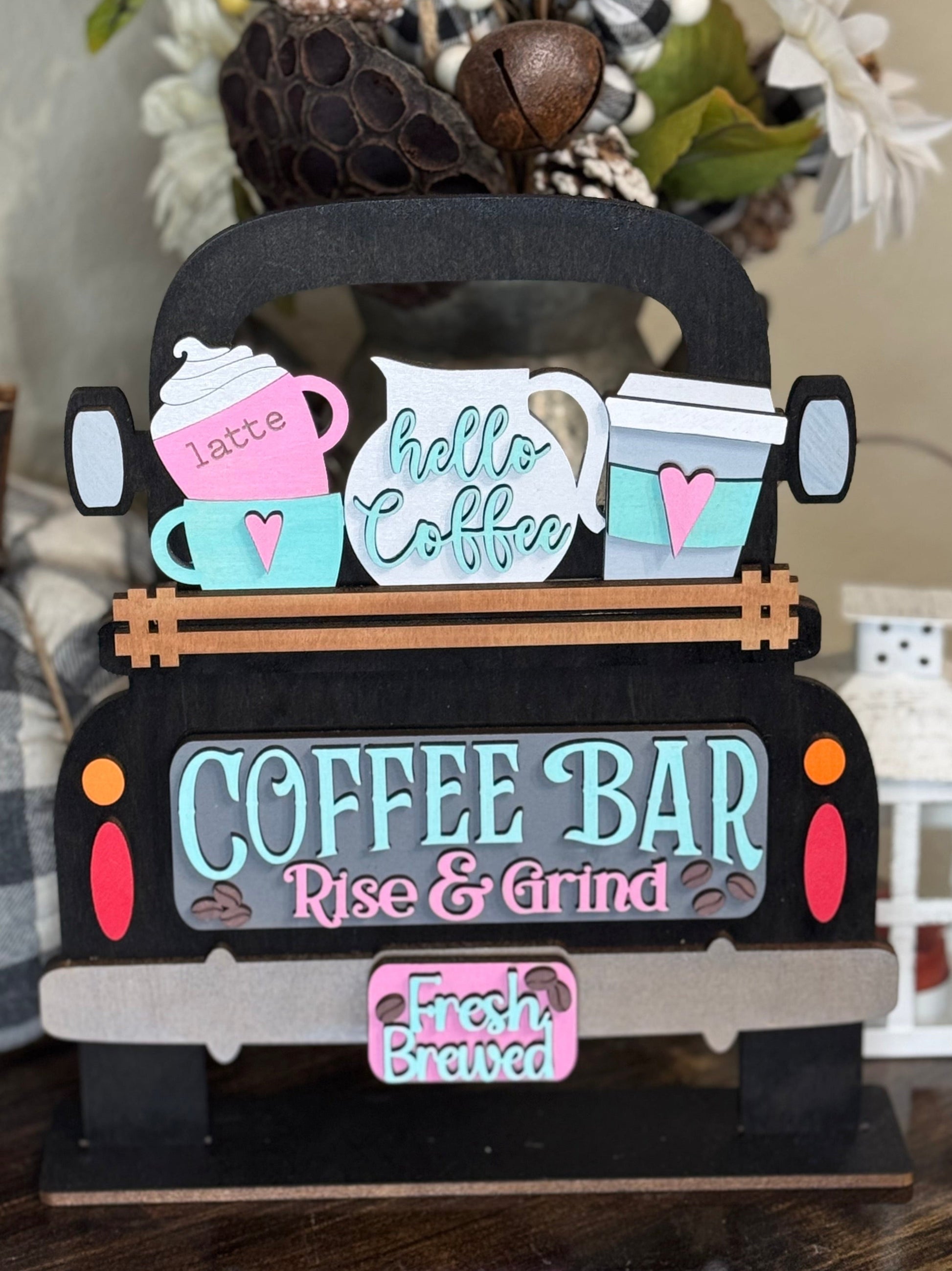 Decorative coffee-themed wood sign with 'Coffee Bar' and 'Rise & Grind' text, surrounded by decorative elements which is an interchangeable insert for our Farmhouse Truck Sign or Shelf Sitter.