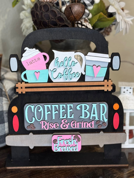 Decorative coffee-themed wood sign with 'Coffee Bar' and 'Rise & Grind' text, surrounded by decorative elements which is an interchangeable insert for our Farmhouse Truck Sign or Shelf Sitter.